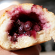two thirds eaten sandwich down to the blueberries